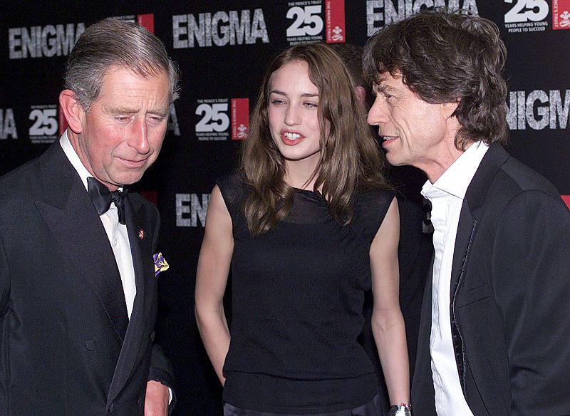 Mick Jagger y su hija Elizabeth, junto a Carlos de Inglaterra