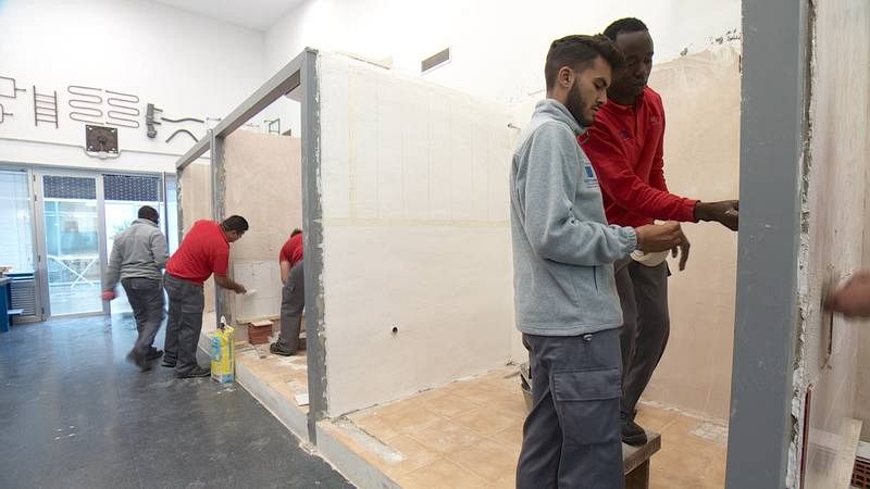  Taller de albañilería en Cáritas Sevilla