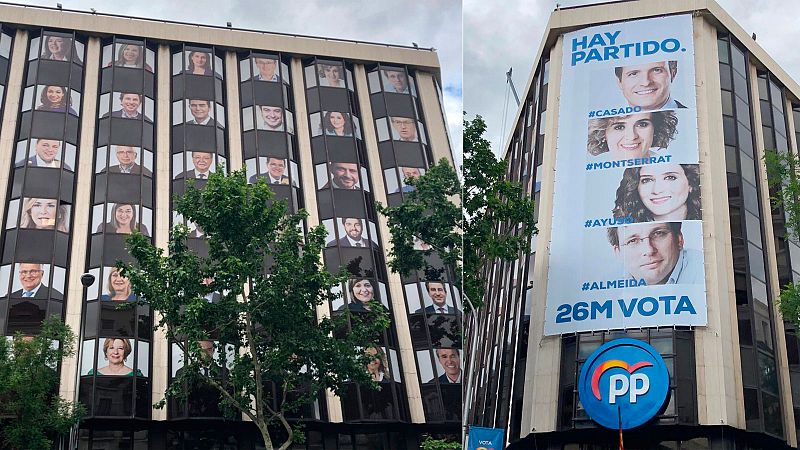 El PP despliega nuevas pancartas en su sede nacional en Madrid para las elecciones del 26M.