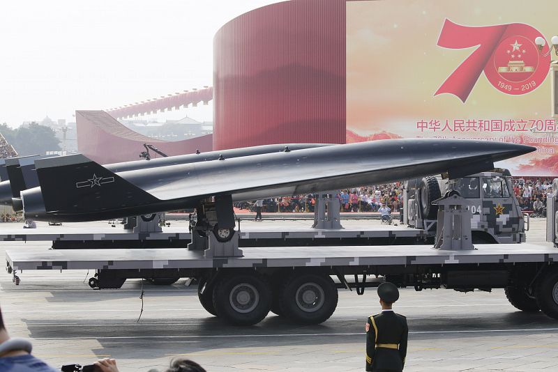 Military vehicle carrying a WZ-8 supersonic reconnaissance drone travels past Tiananmen Square during military parade marking the 70th founding anniversary of People's Republic of China