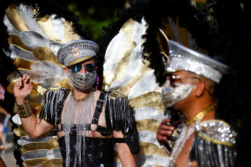 Varias personas participan en la marcha del Orgullo LGTBI en Madrid.