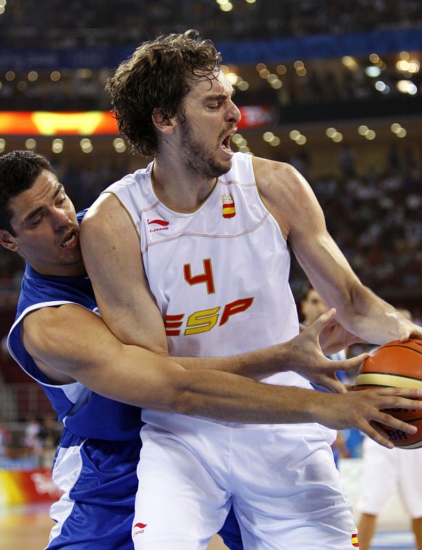 Gasol of Spain and Fotsis of Greece battle for ball during men's basketball game at Beijing 2008 Olympic Games