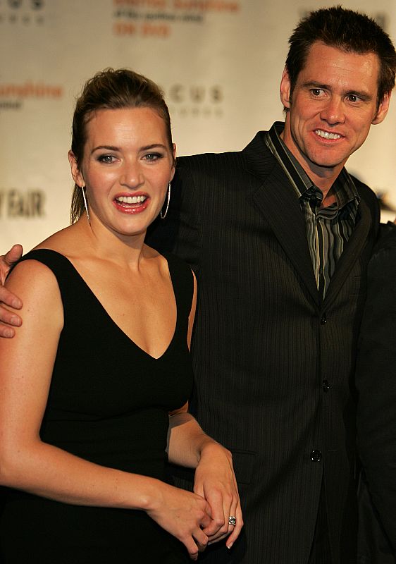 Cast members Kate Winslet and Jim Carrey pose at the DVD launch party for Eternal Sunshine of the ...