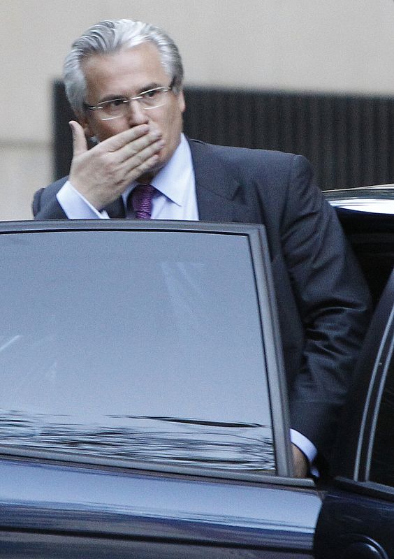 Spanish High Court judge Baltasar Garzon gestures as he leaves the High Court in Madrid