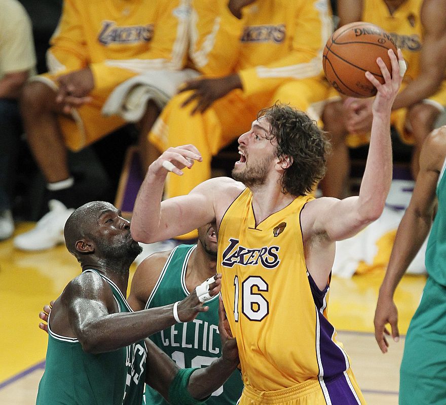 Los Angeles Lakers Gasol goes to the basket against Boston Celtics Garnett during Game 6 of the 2010 NBA Finals basketball series in Los Angeles