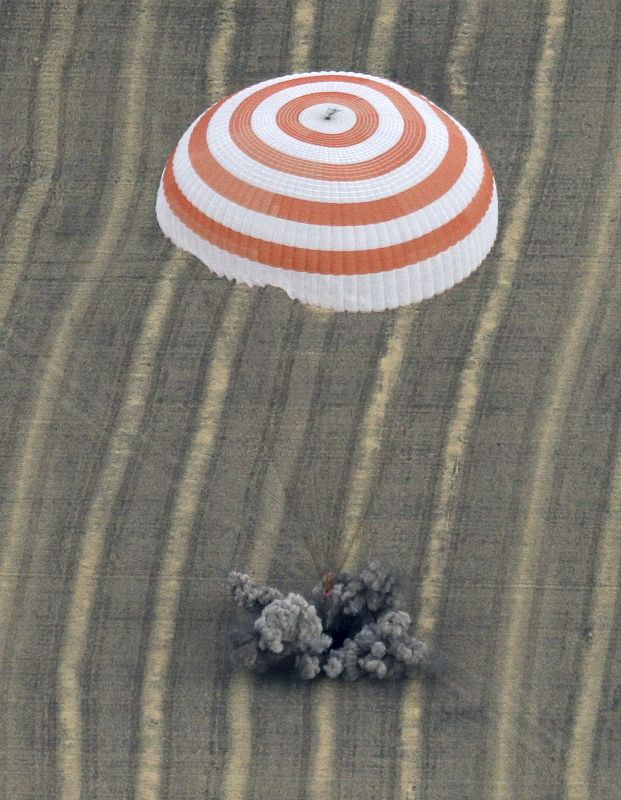 The Soyuz TMA-18 spacecraft is seen as it lands near the town of Arkalyk, northern Kazakhstan