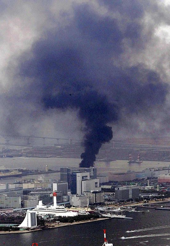 Building burns in Tokyo after an earthquake