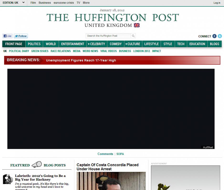 La página principal de 'The Huffington Post' luce una banda negra en señal de las ciberprotestas producidas contra la ley SOPA y dirige a diferentes noticias al respecto.