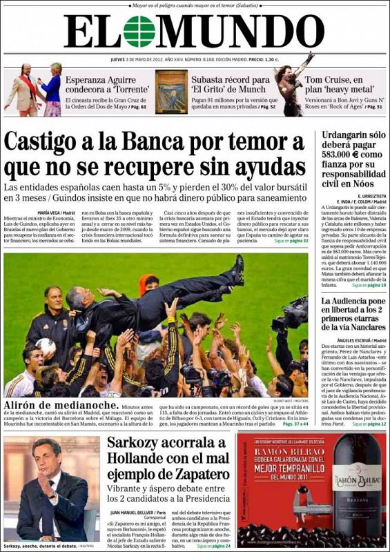 El Mundo abre su portada con la imagen de Mourinho manteado por sus jugadores y titula el pie de la foto con ese "alirón de medianoche".