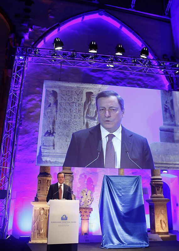 Draghi, President of the European Central Bank (ECB), delivers his speech before unveiling the new 5 euro note Frankfurt