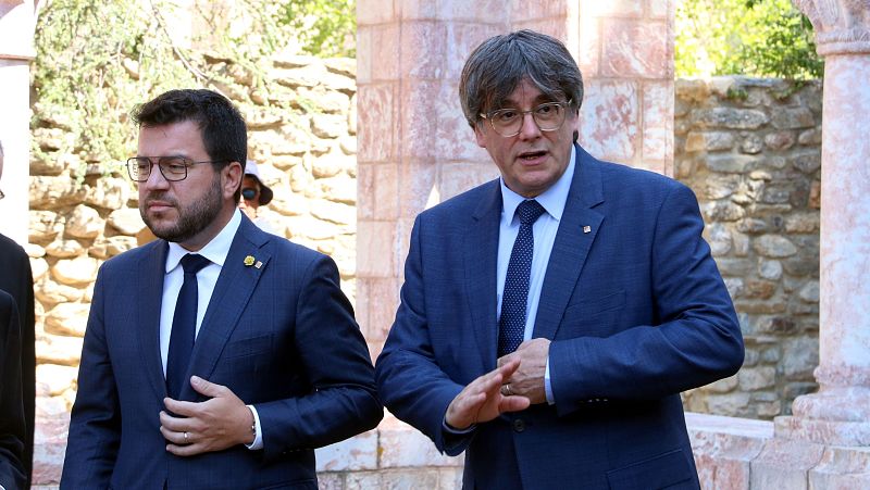 Pere Aragonès i Carles Puigdemont durant un acte
