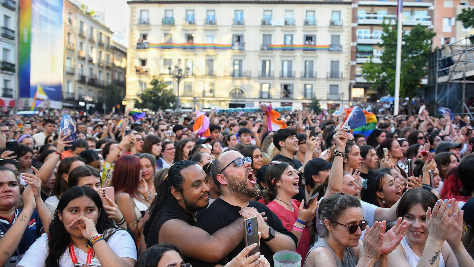 Centenas de personas durante el pregón del Orgullo de Madrid 2024, en la Plaza de Pedro Zerolo