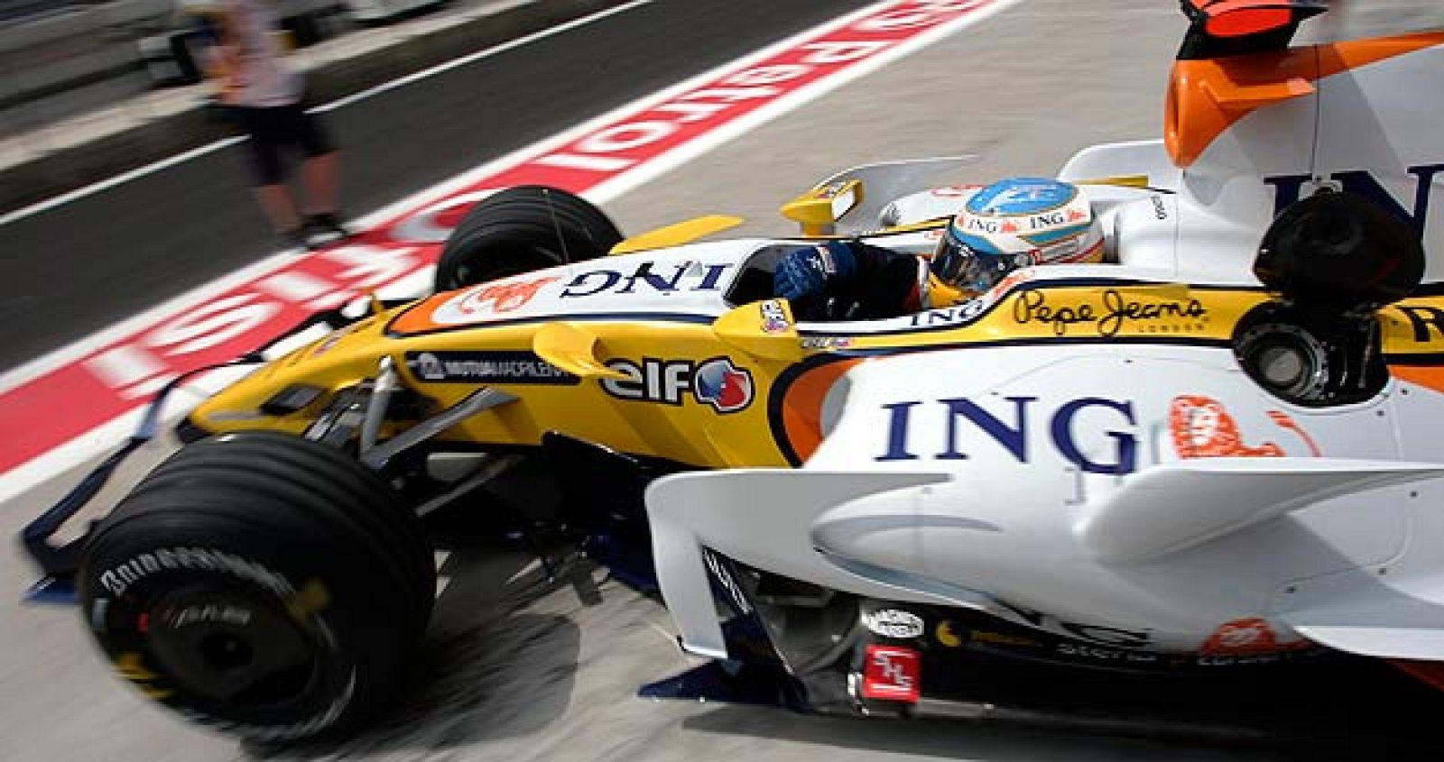 Renault's Formula One driver Fernando Alonso of Spain leaves the pit