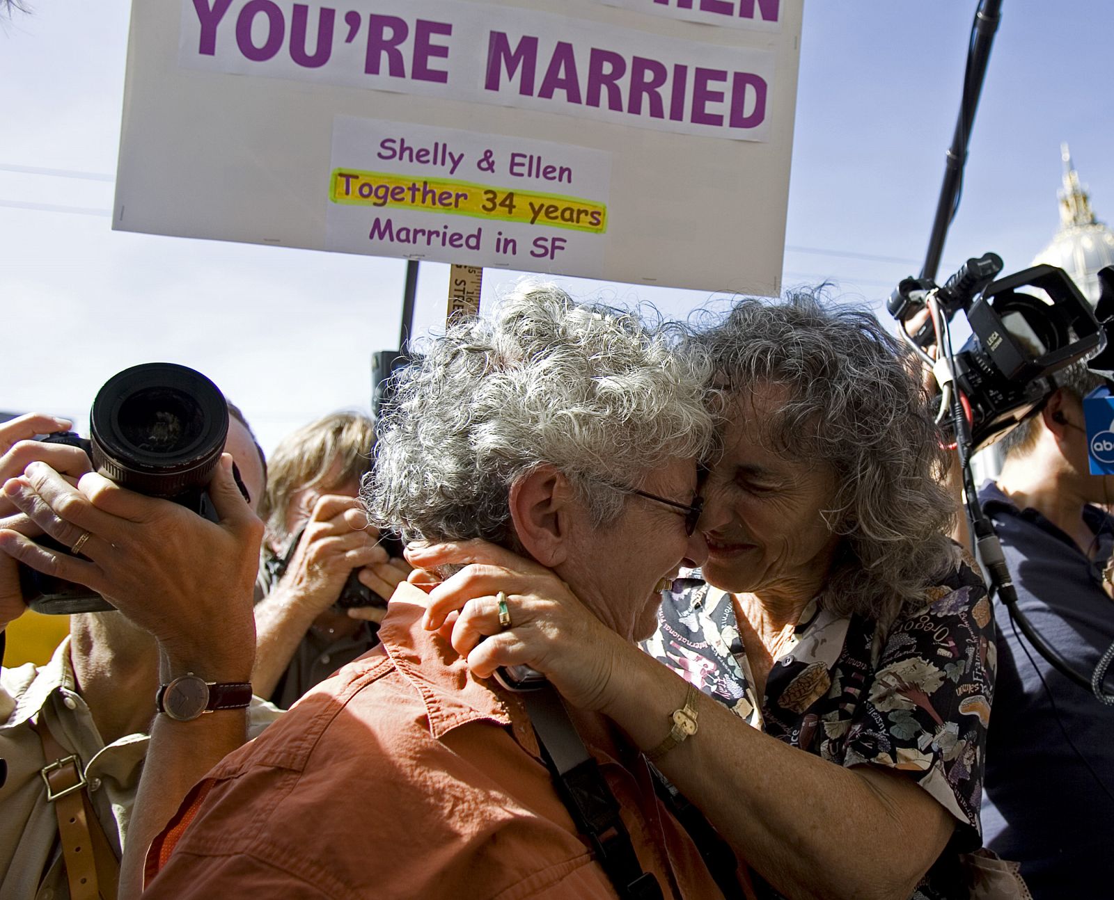 Shelly Bailes and her partner Ellen Pontac hug after hearing a decision by California's Supreme Court in San Francisco