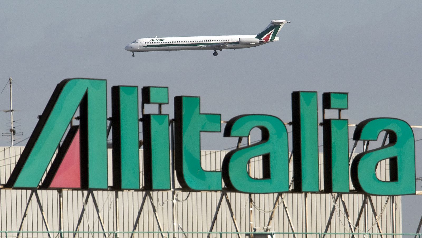 Alitalia jet makes a landing approach at Fiumicino airport in Rome