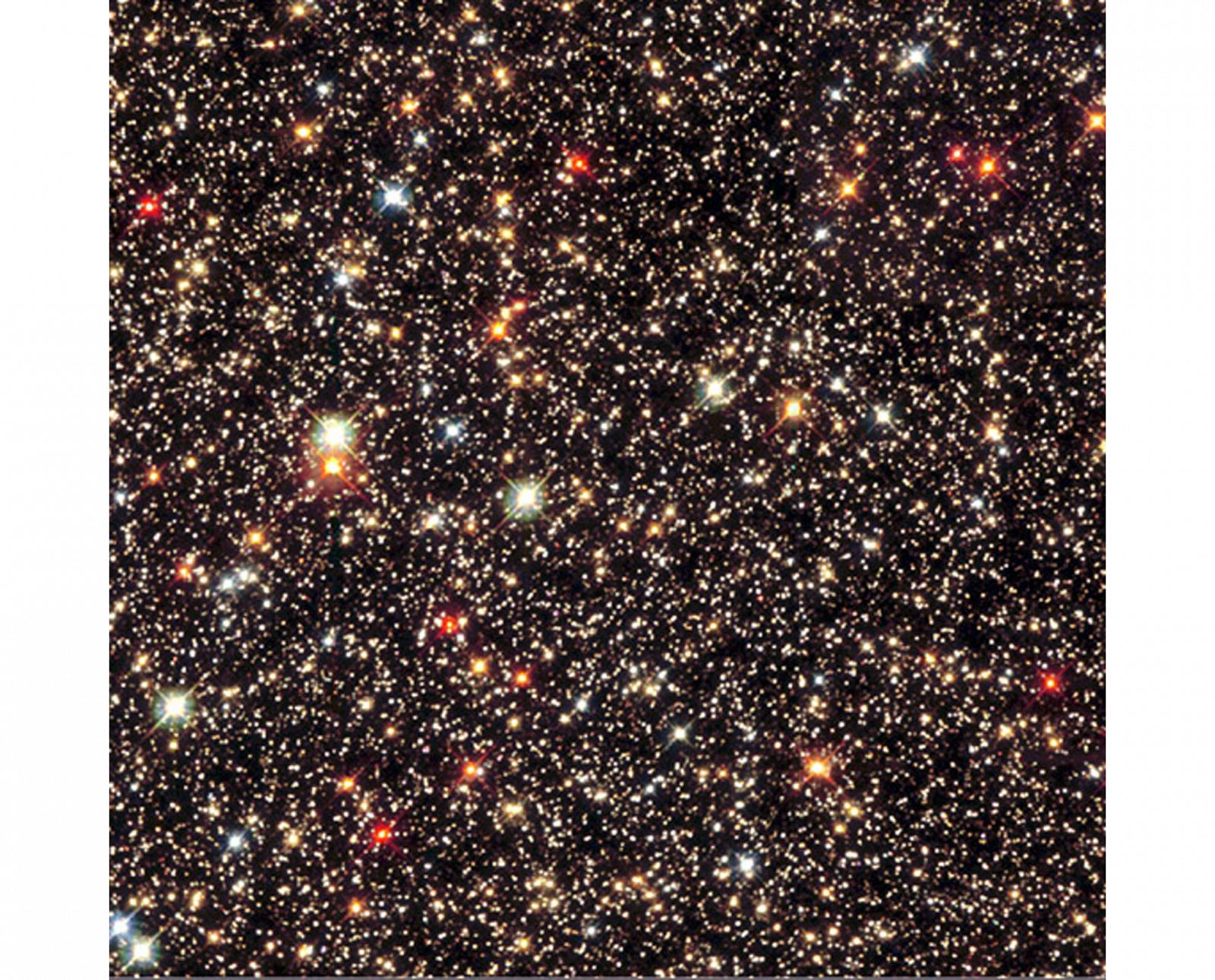 Una imagen de estrellas brillando en la Vía Láctea tomada por el telescopio Hubble de la NASA.