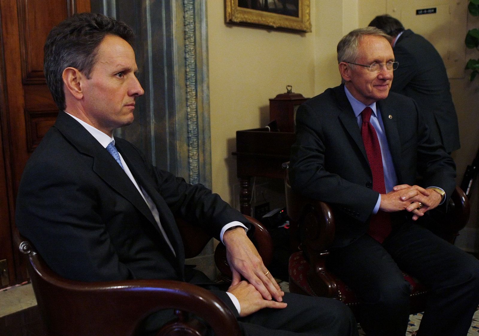 U.S. Treasury Secretary nominee Timothy Geithner meets with Senate Majority leader Harry Reid on Capitol Hill in Washington