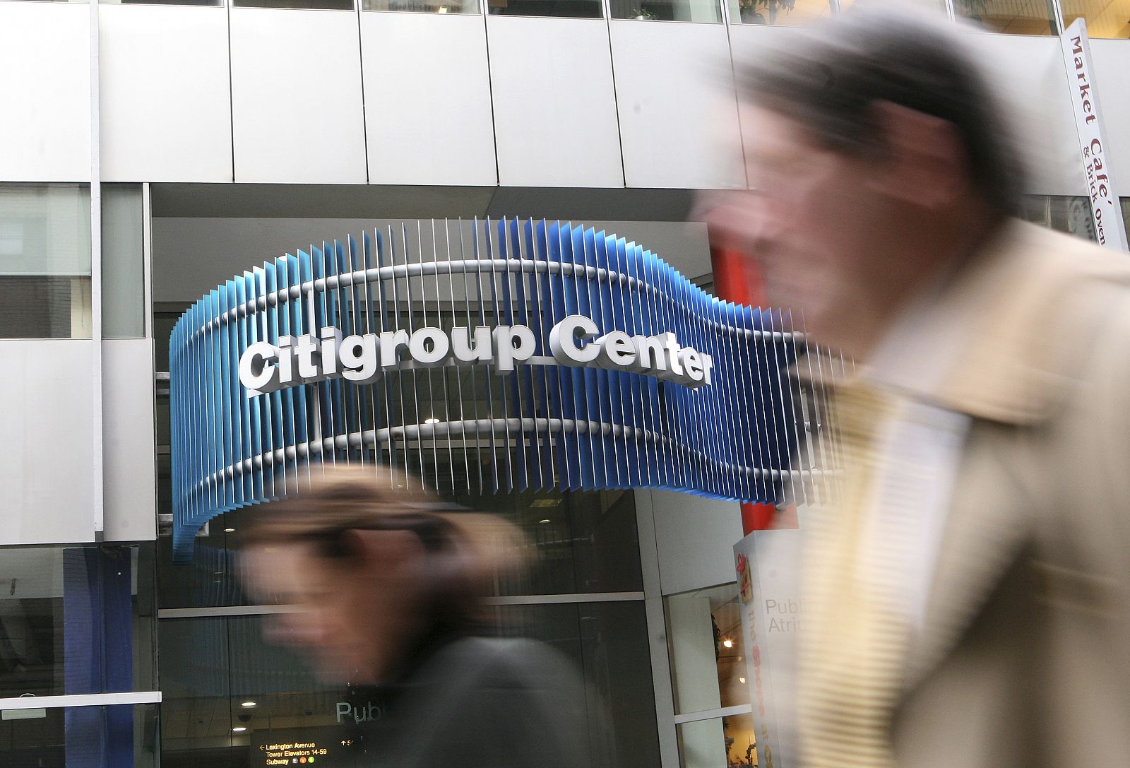 People walk past the Citigroup headquarters in New York