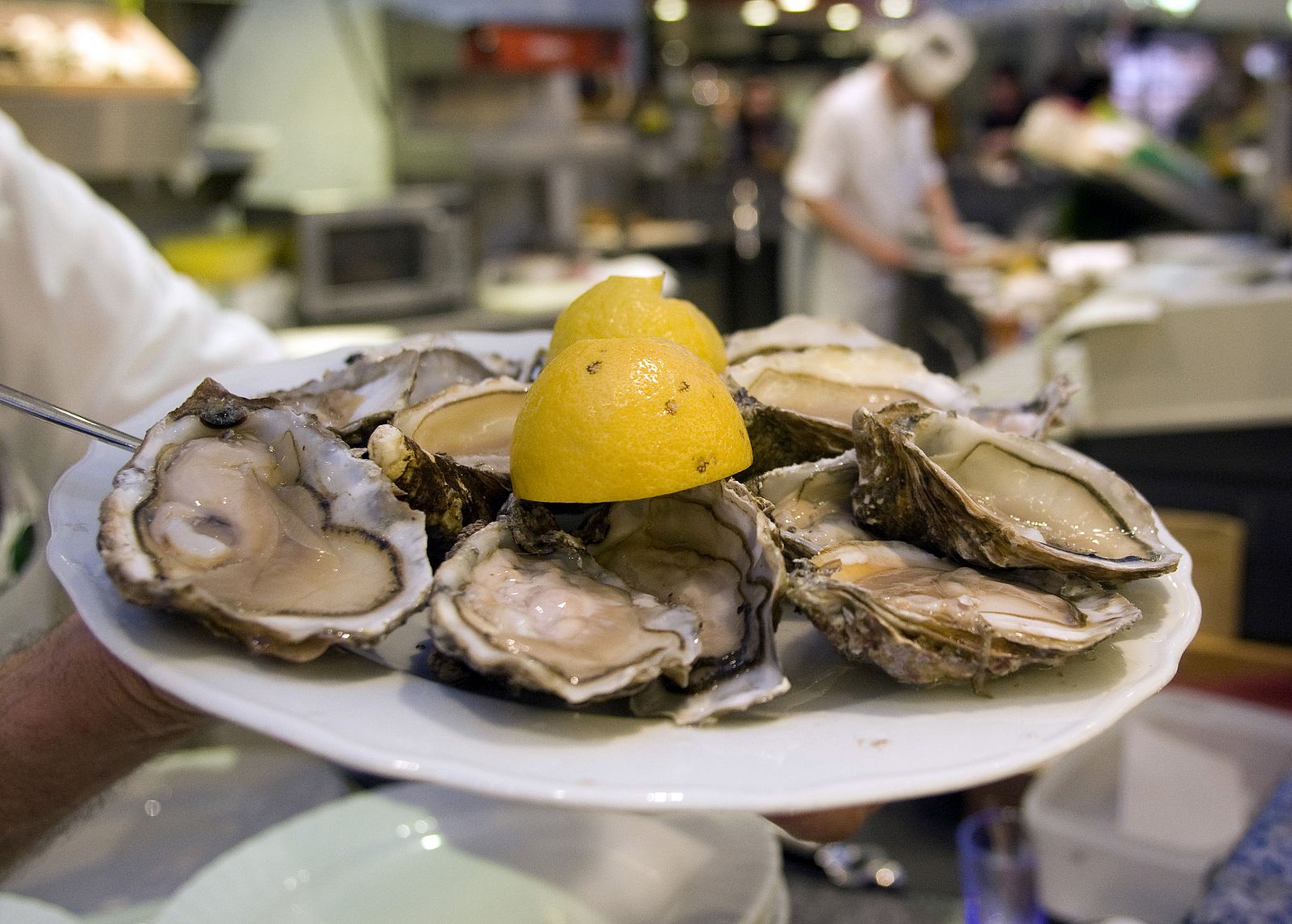 A plate of oysters is seen in the food hall at the KaDeWe department store in Berlin