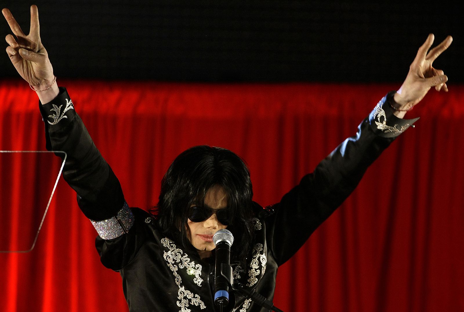 U.S. pop star Michael Jackson gestures during a news conference at the O2 Arena in London