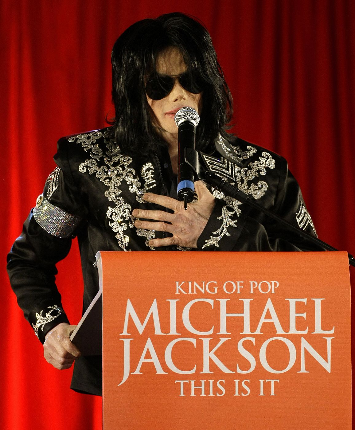 U.S. pop star Michael Jackson gestures during a news conference at the O2 Arena in London