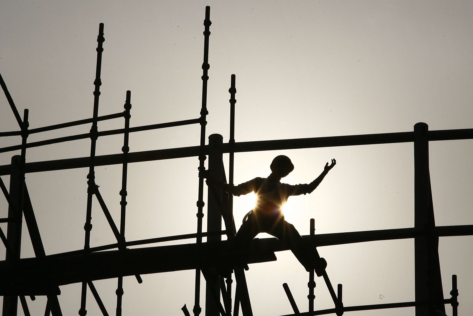 Trabajador en edificio en construcción