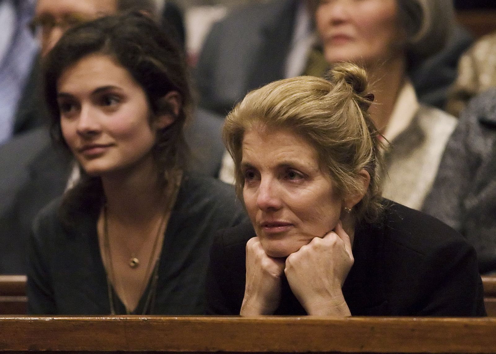 Caroline Kennedy Schlossberg and her daughter Rose listen during a special convocation ceremony in Cambridge