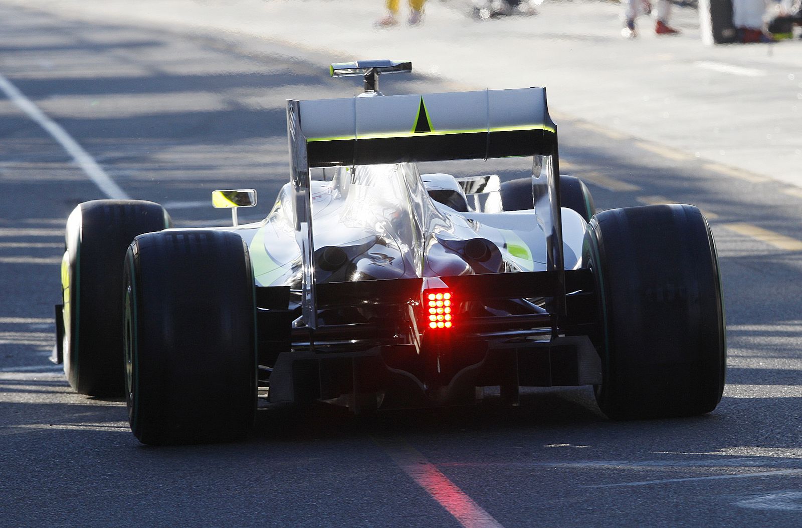 Brawn GP Formula One driver Barrichello of Brazil drives in pit lane during the qualifying session at Australian F1 Grand Prix in Melbourne