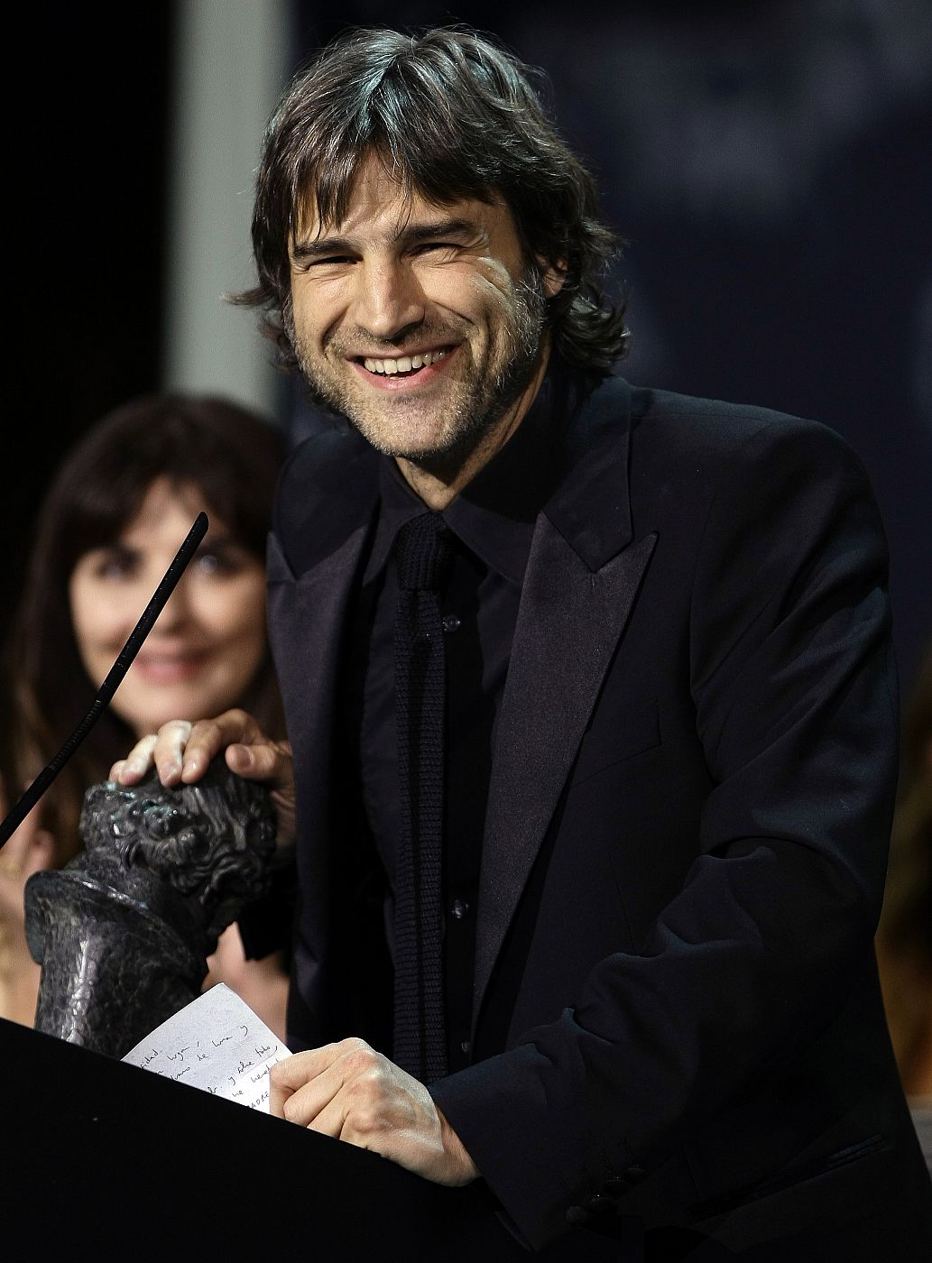 Actor Alberto San Juan smiles as he accepts his Best Actor award during the Spanish Film Academy "Goya" awards ceremony in Madrid