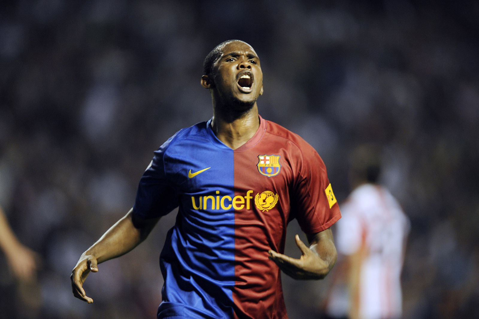 Barcelona's Samuel Etoo celebrates scoring against Athletic Bilbao during their Spanish First Division soccer match at San Mames stadium in Bilbao
