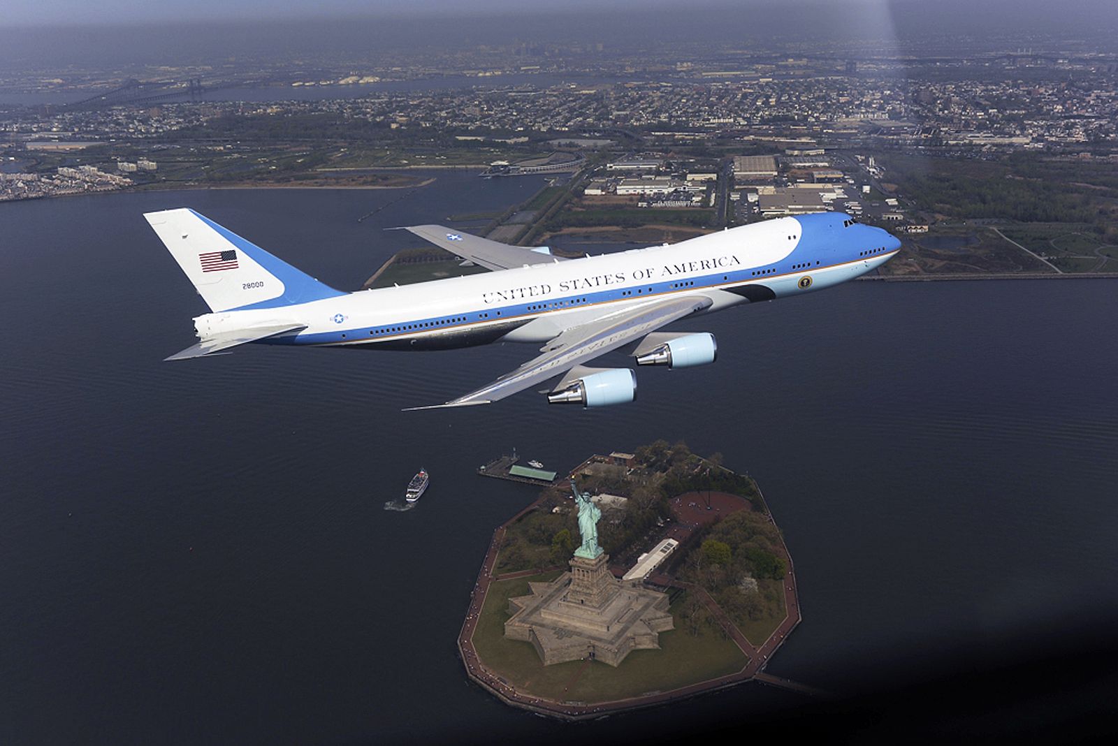 Handout of Air Force presidential aircraft, part of the fleet used by U.S. presidents, is pictured above the Statue of Liberty in New York
