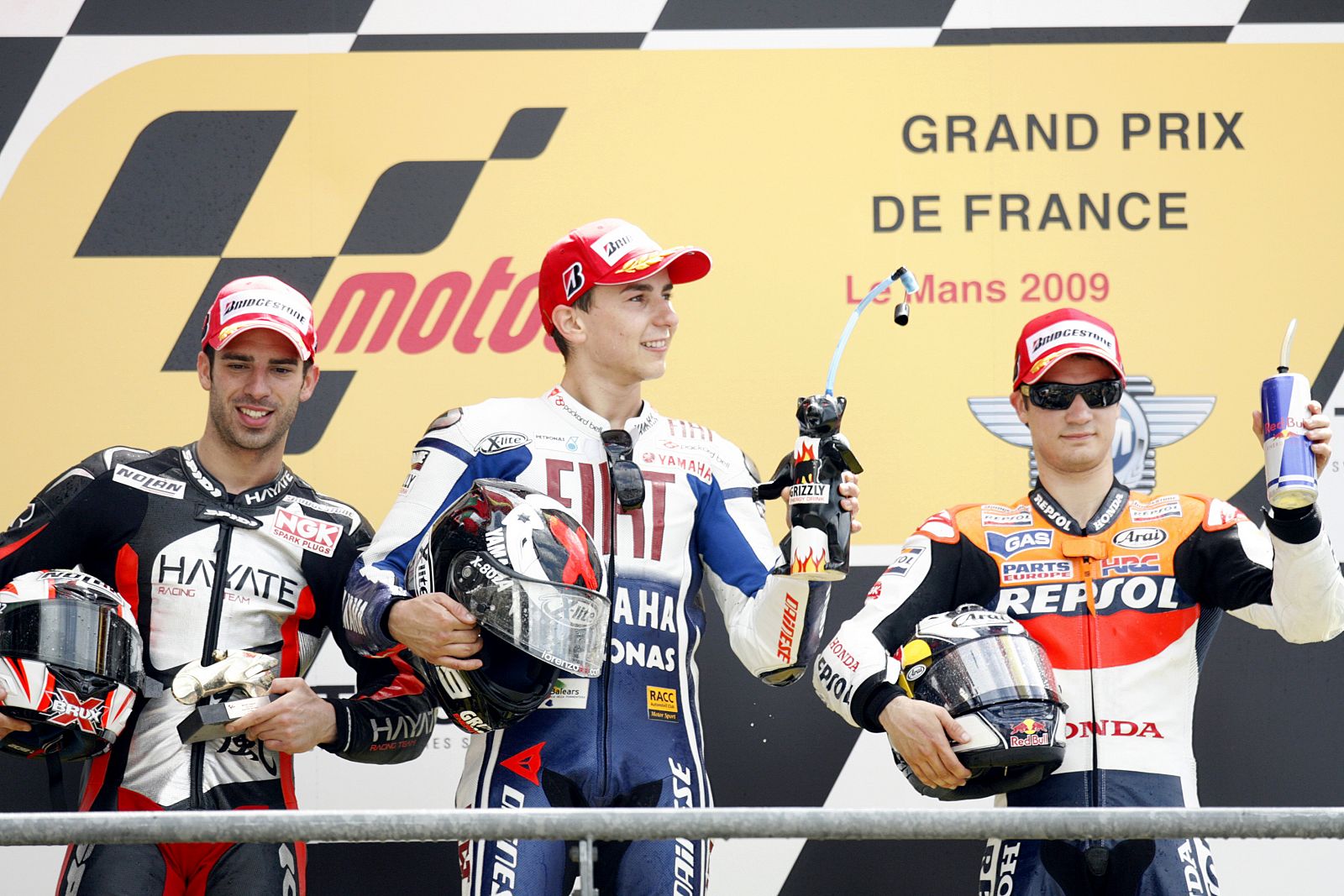 Jorge Lorenzo, Marco Melandri y Dani Pedrosa, en el podio del Gran Premio de Le Mans.