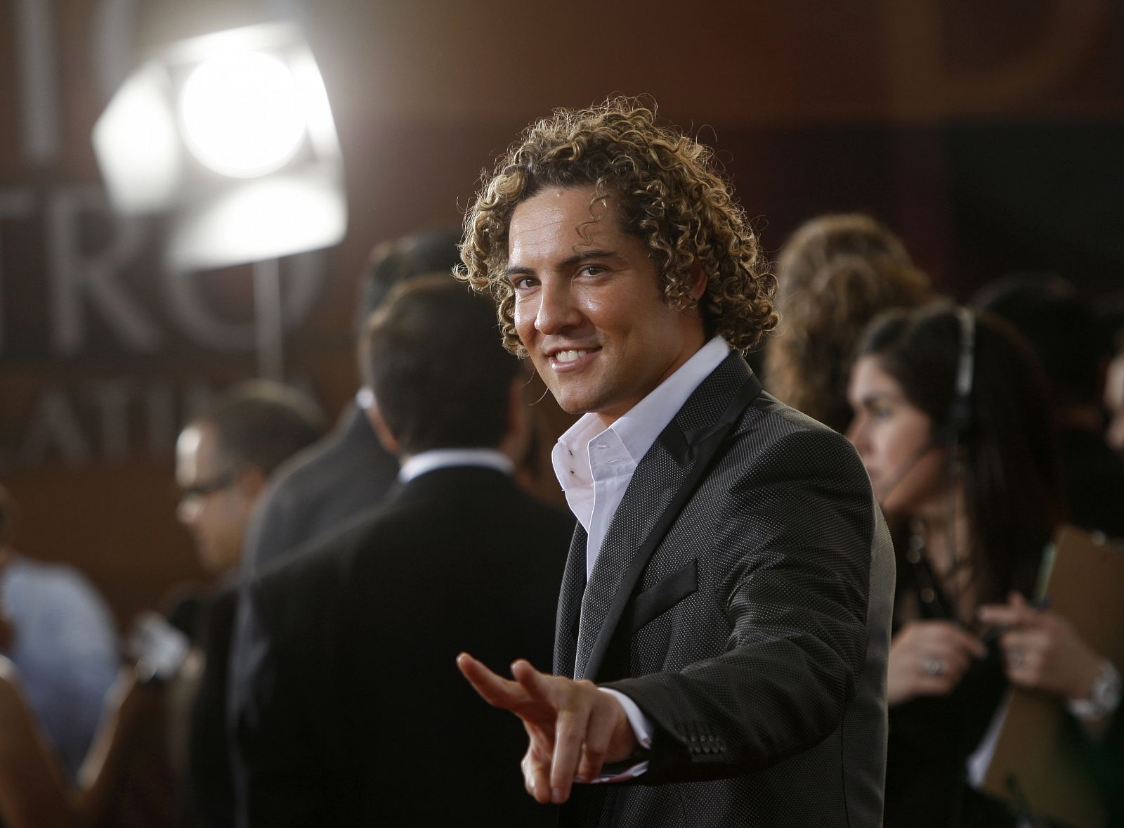 Spanish pop singer David Bisbal poses on the red carpet at the Premio Lo Nuestro Latin music awards show in Miami