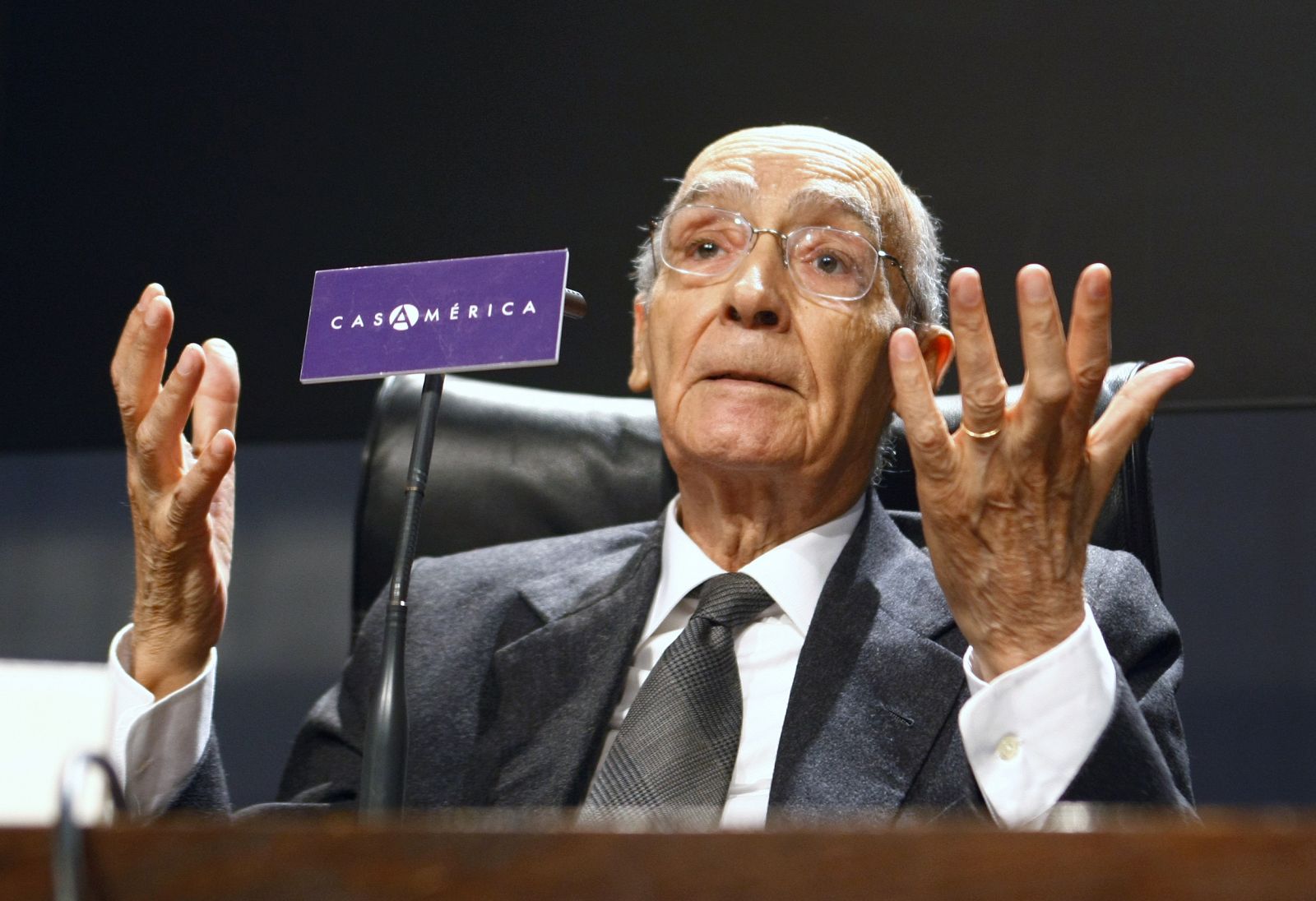 Portuguese Nobel Literature laureate Jose Saramago gestures during a news conference in Madrid