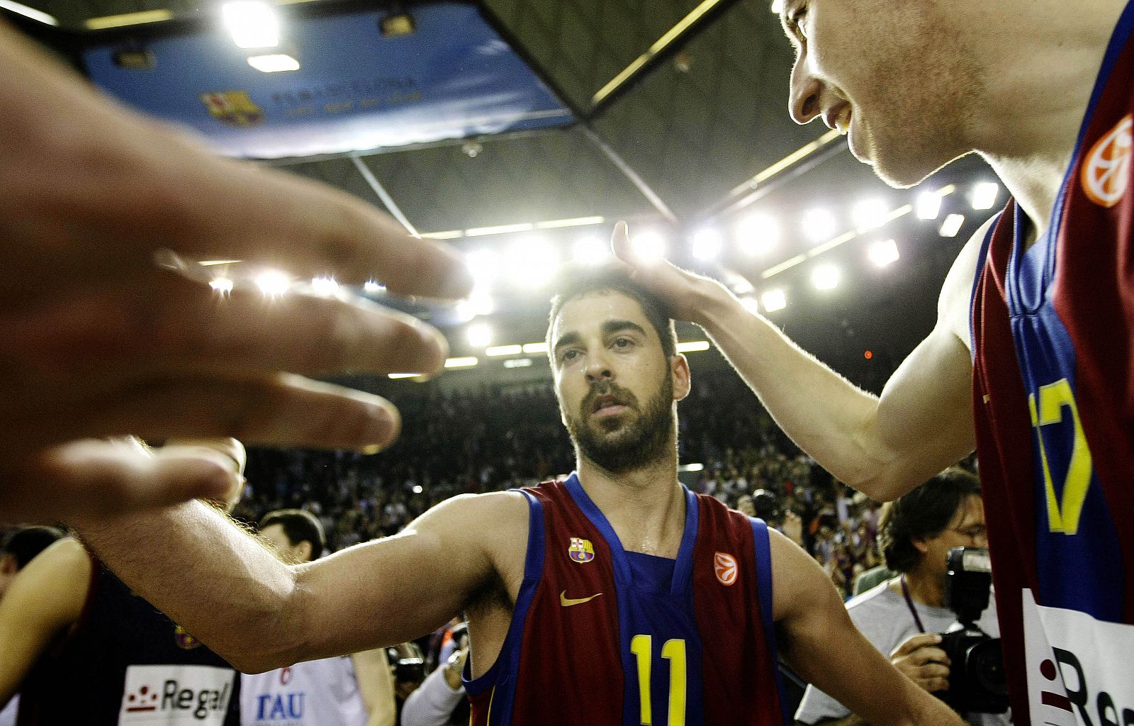 Barcelona's Navarro celebrates with teammates  victory against Tau Ceramica in Euroleague quarter-final basketball game in Barcelona