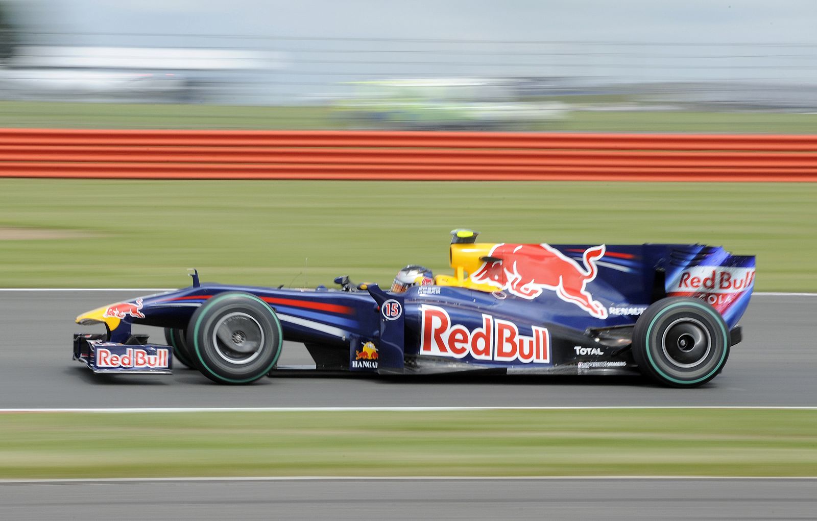 Red Bull Formula One driver Vettel of Germany drives during a practice session for the British F1 Grand Prix at Silverstone