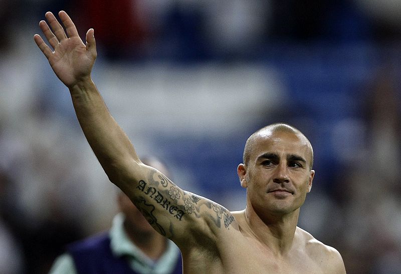 Real Madrid's Cannavaro acknowledges the supporters after their Spanish first division soccer match against Real Mallorca at the Santiago Bernabeu stadium in Madrid