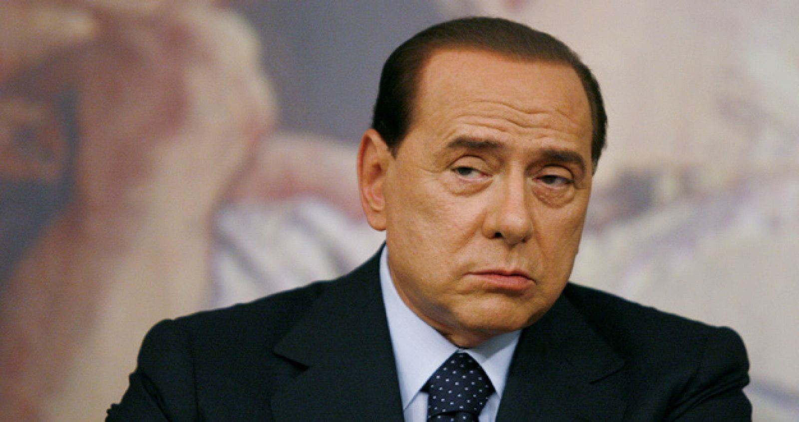 El primer ministro y presidente del Milan Silvio Berlusconi