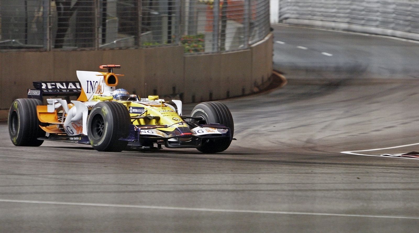 Renault Formula One driver Fernando Alonso of Spain negotiates turn 13 during the Singapore F1 Grand Prix at the Marina Bay circuit