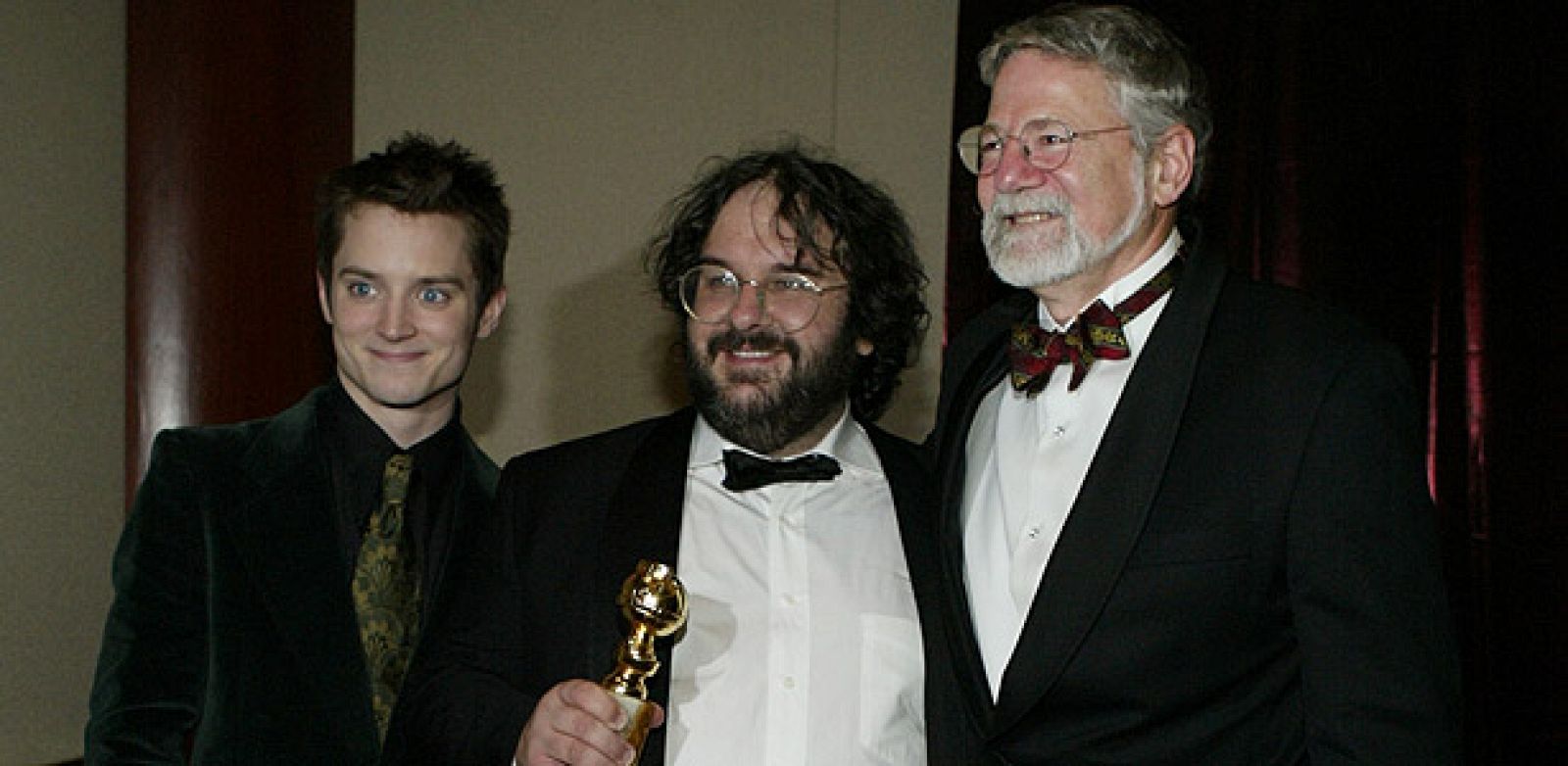 Barrie Osborne, Peter Jackson y Elijah Wood recogen los Globos de Oro que ganó 'El Señor de los anillos' en 2004