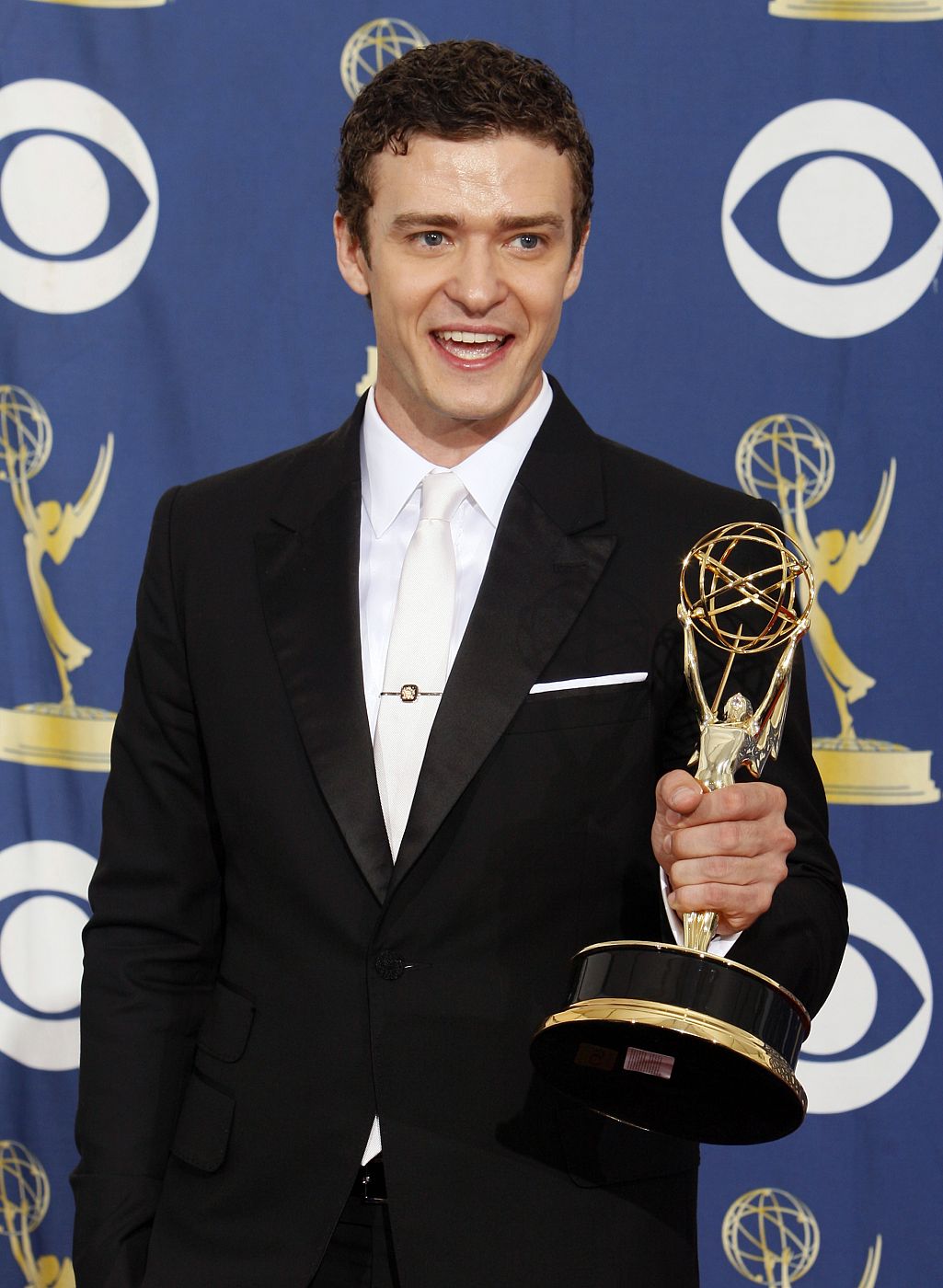 Timberlake poses with his award for best guest actor award for a comedy series at the 61st annual Primetime Emmy Awards in Los Angeles