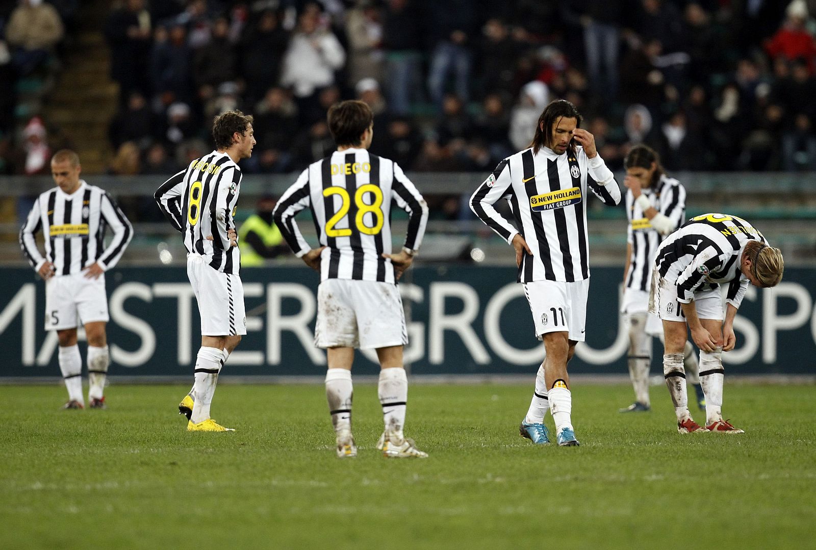 Juventus' players react after Bari's Almiron scored during their Italian Serie A soccer match in Bari
