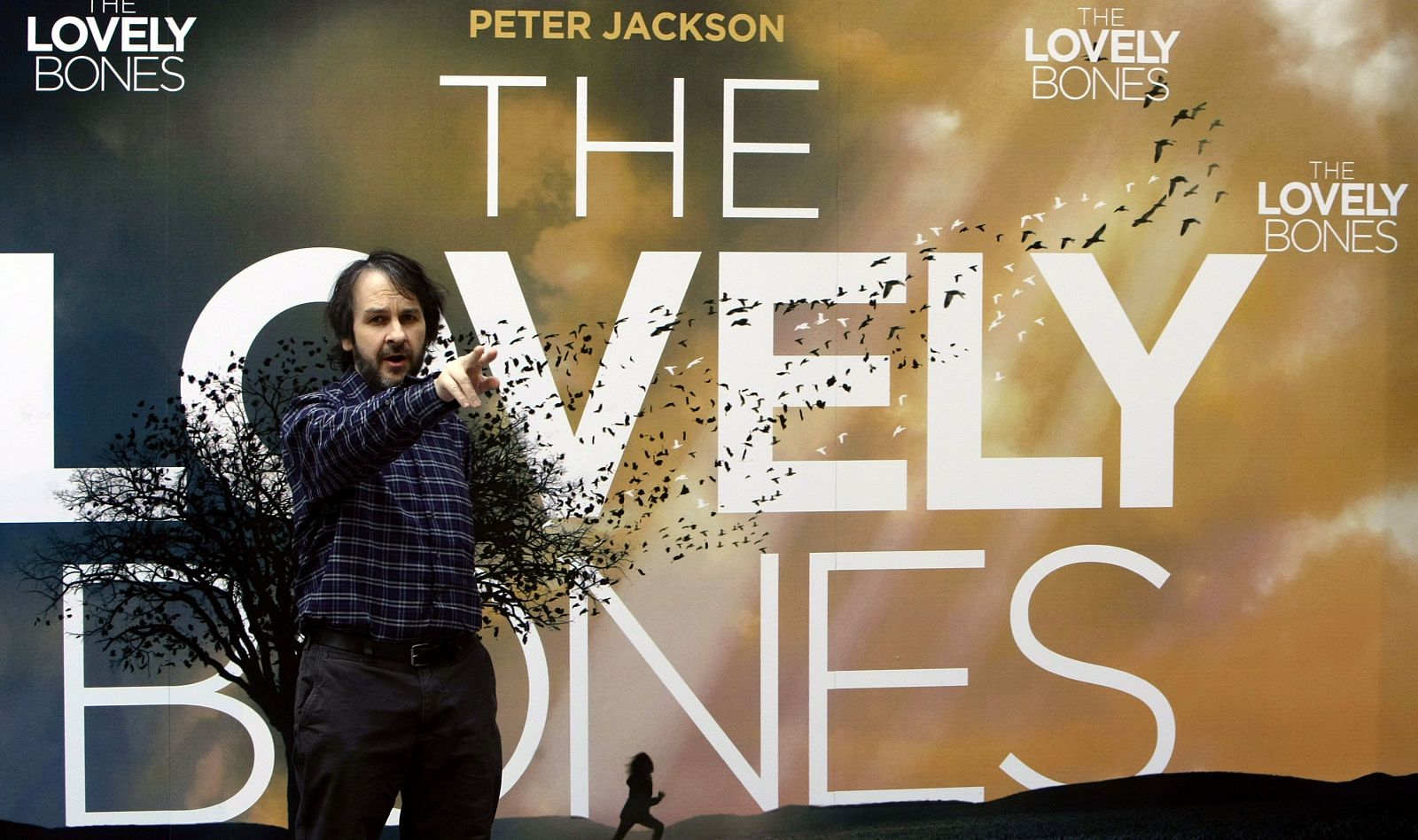 Film director Jackson gestures during a photocall to promote his latest film The Lovely Bones in Madrid
