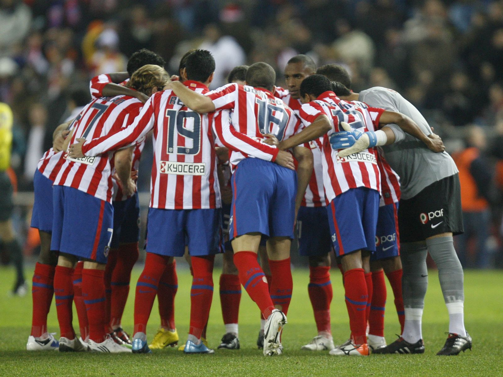 Los jugadores del Atlético de Madrid conjurándose.