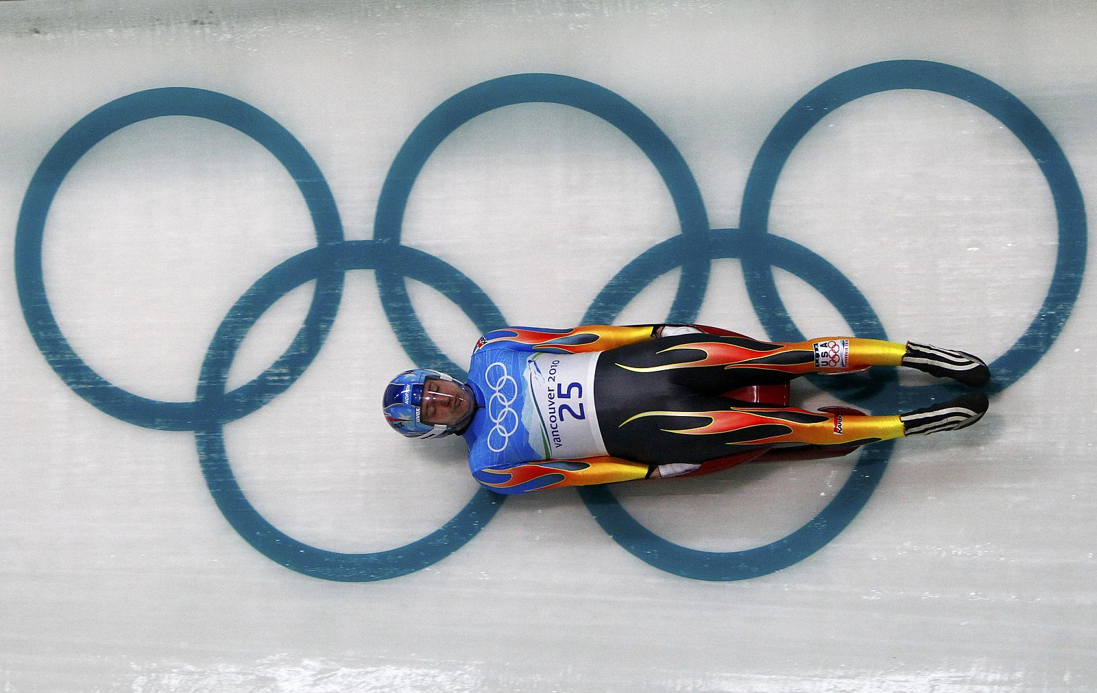 Benshoof of the U.S. speeds down the track during a training run for the men's singles luge in preparation for the Vancouver 2010 Winter Olympics in Whistler