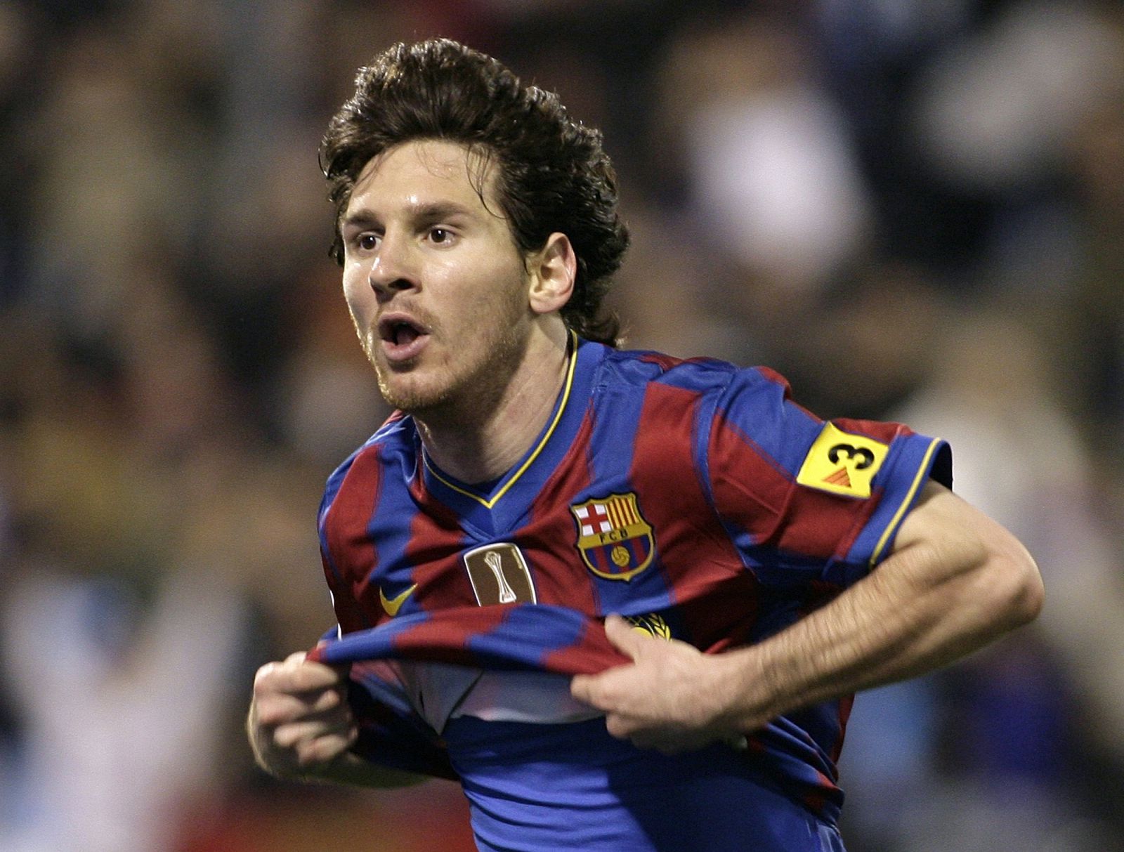 Barcelona's Messi celebrates his second goal against Zaragoza during Spanish first division soccer match in Zaragoza