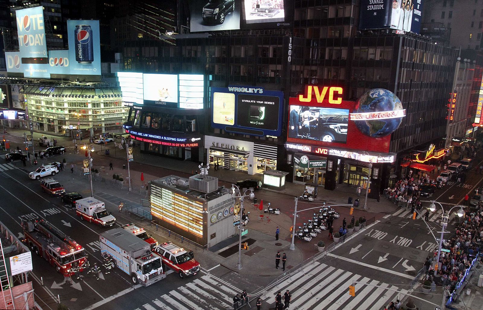 New York's Times Square is empty of tourists after police and fire personnel close off parts of the area