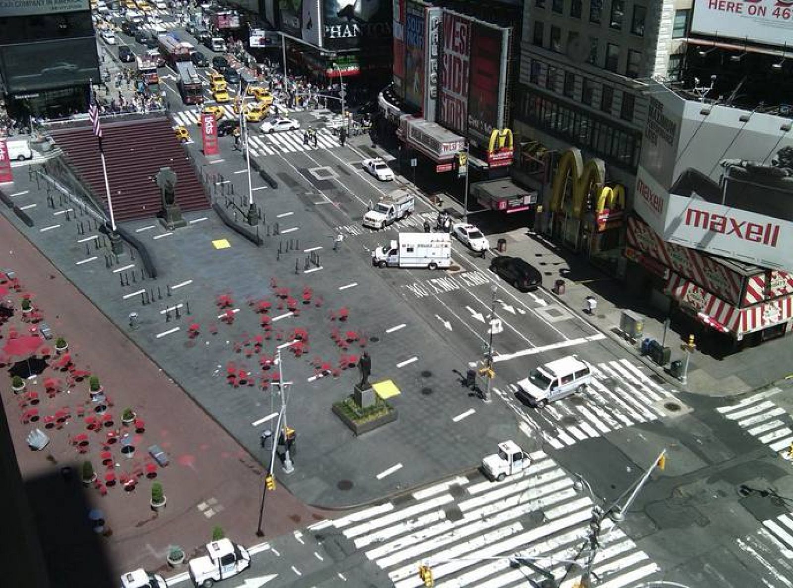 An area of Times Square is evacuated as police investigate a suspicious package on the street in New York