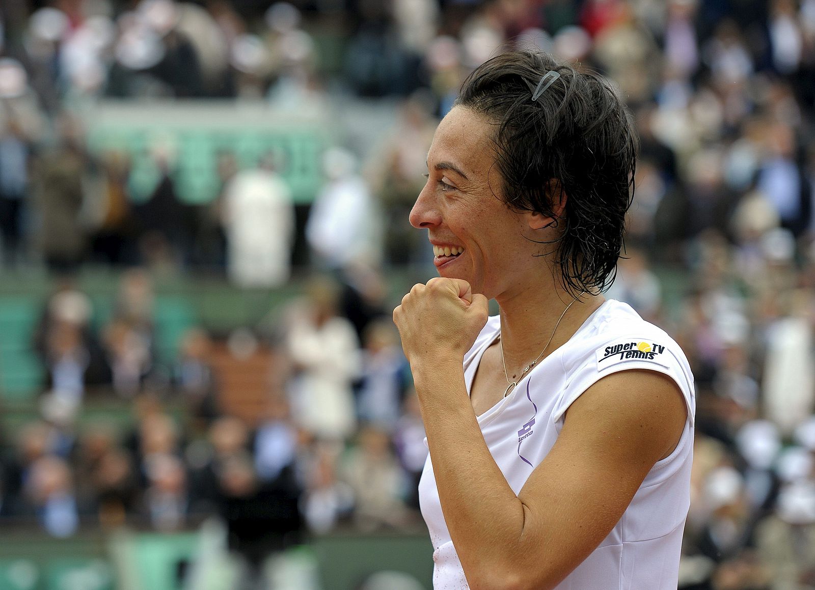 La italiana Francesca Schiavone celebra su victoria sobre la danesa Caroline Wozniacki.