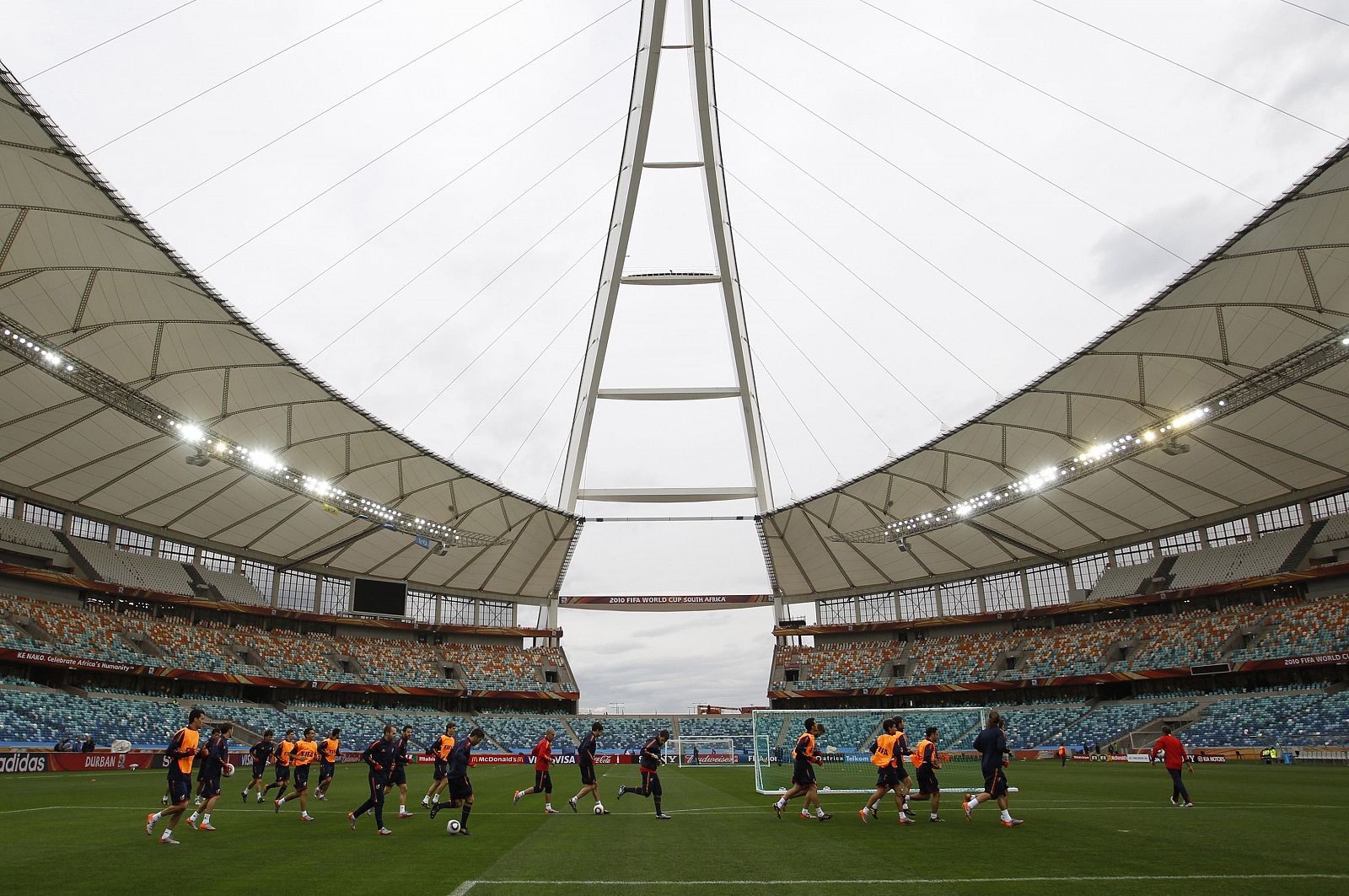 Spain's players warm up during a soccer training session in Durban